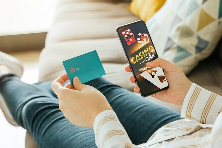 Aplikasi magetoto ditampilkan di perangkat Android dengan meja live dealer